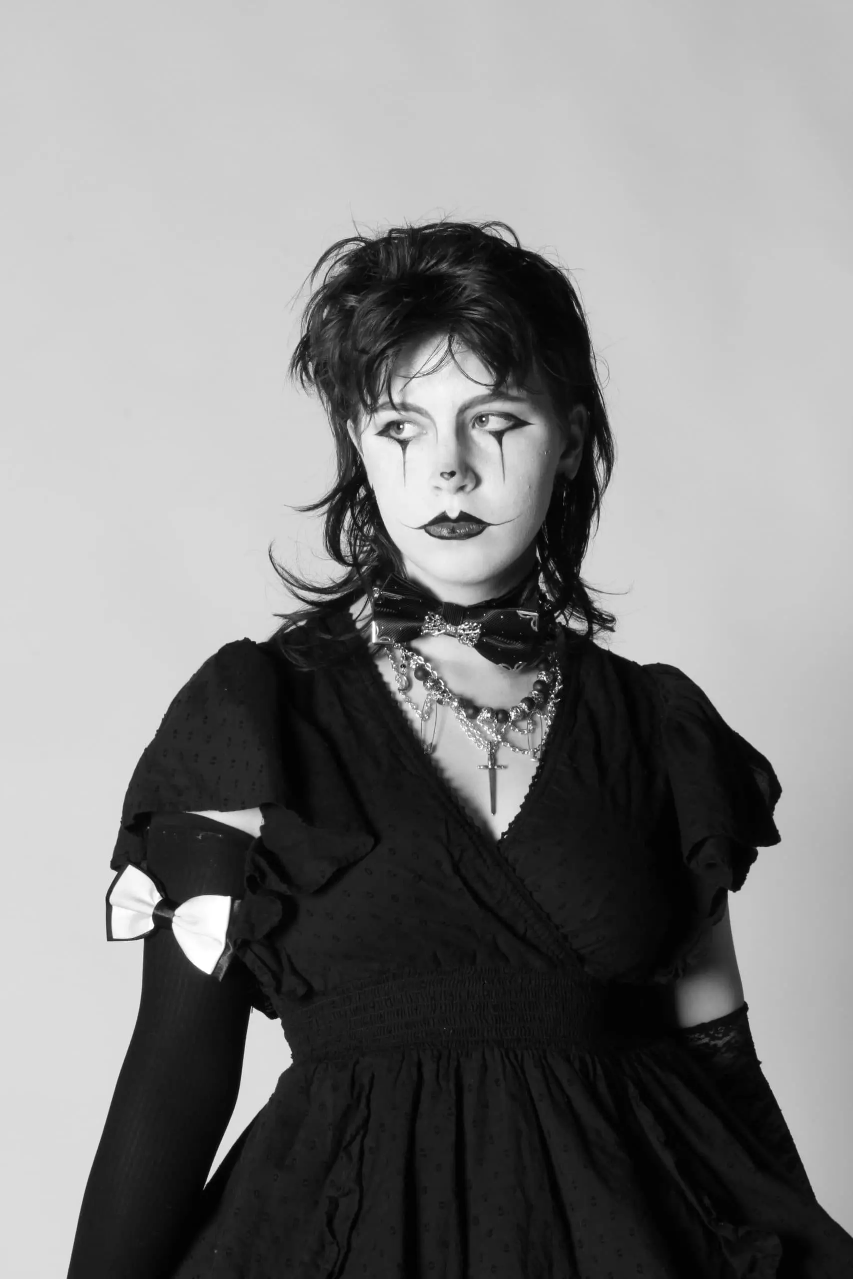 Black and White portrait of girl dressed up as clown